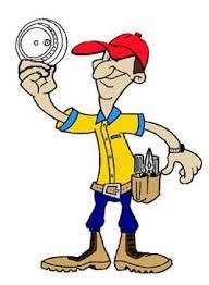 man installing smoke alarm